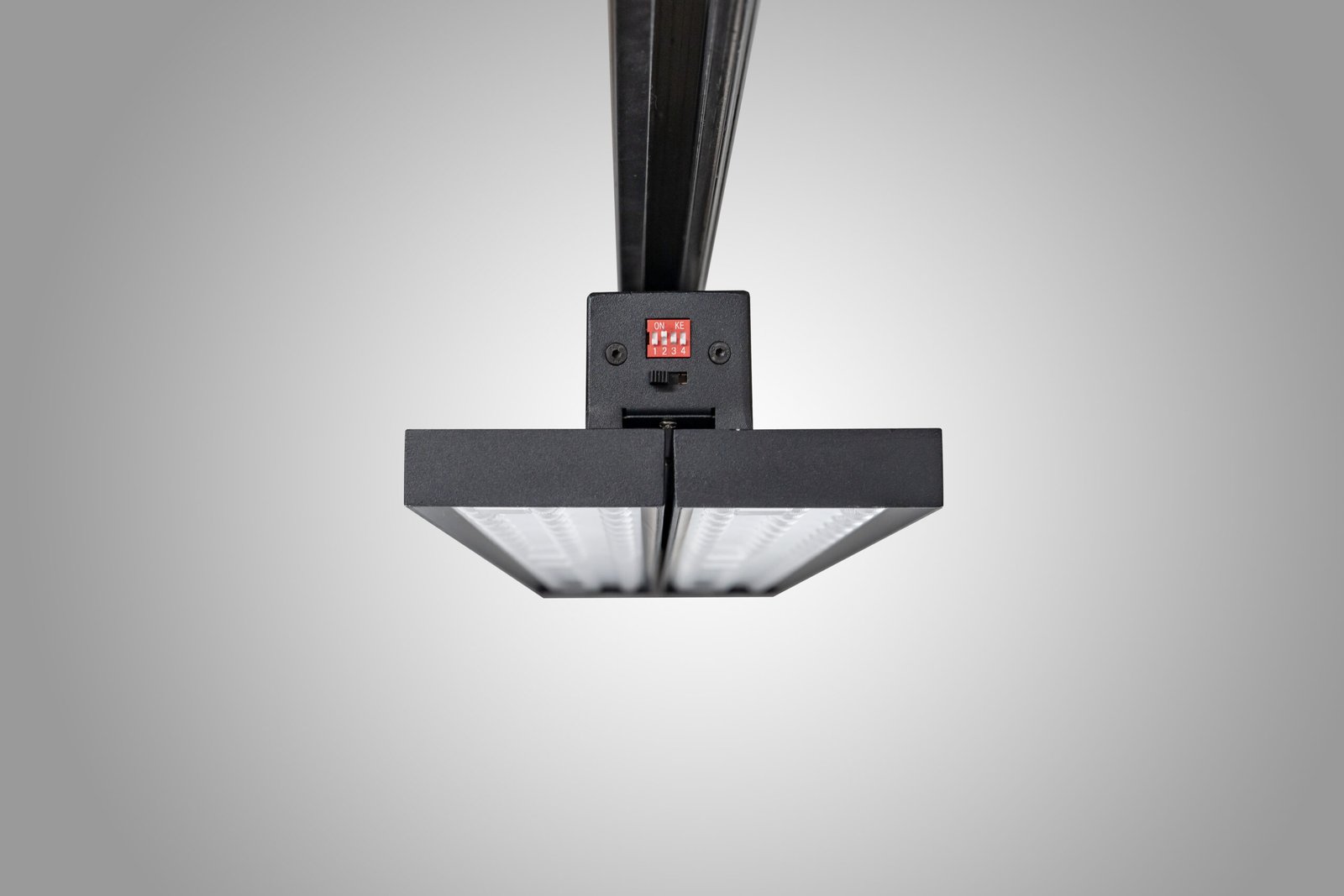 Front view of a dual-panel track light with both panels aligned